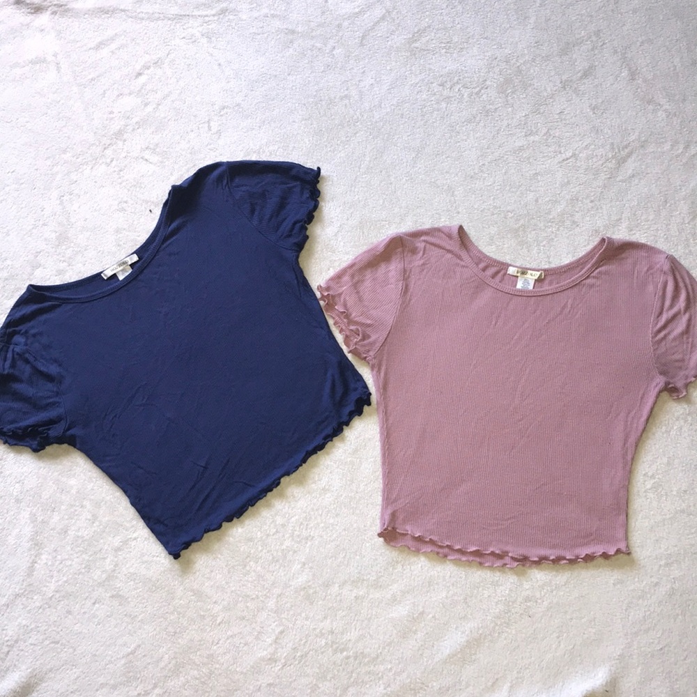 2 crop tops. Grew out of them. Hardly worn.